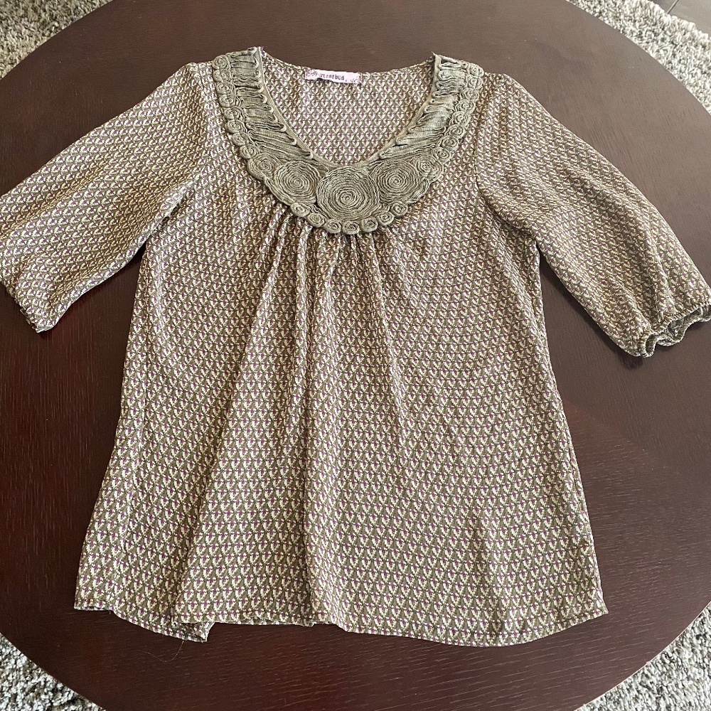 Rosebud 3/4 sleeve top with embellished neckline